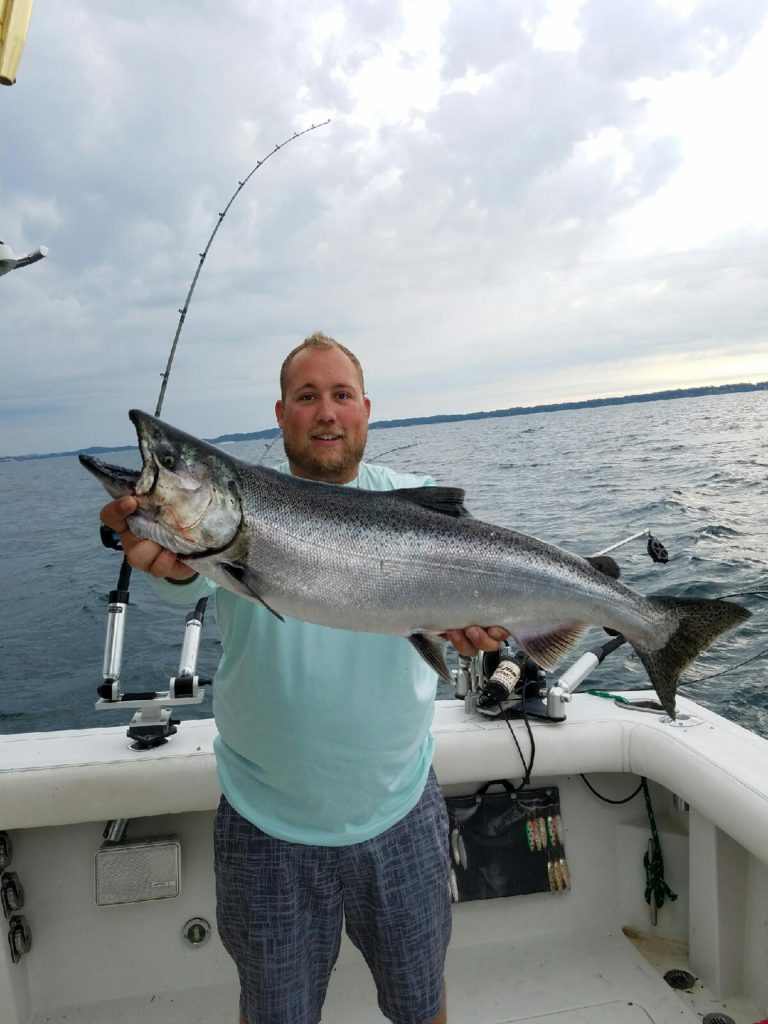 Big King Salmon - 14.5 lbs. Posing with Capt Drew 